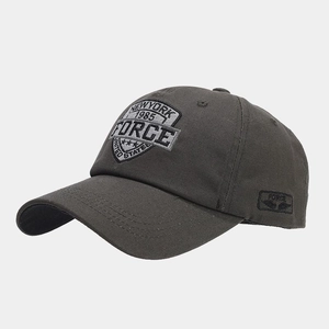 Detail of embroidered New York 1985 shield patch on breathable mesh baseball cap