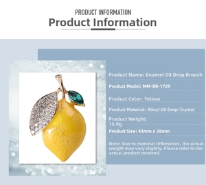 Macro view of lemon enamel brooch with vibrant yellow finish and sparkling rhinestones