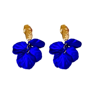 Retro gold hammered metal earrings with layered vibrant blue petals in a drop design