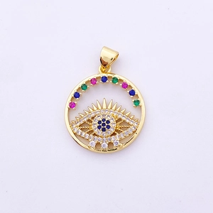 Detail of evil eye pendant with blue zircon, white crystals and colorful gems