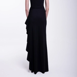 Detailed back view of a slim black swimsuit featuring elegant side ruffle embellishments