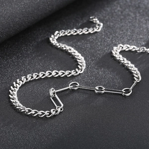 Minimalist silver stainless steel Cuban link necklace with bar and ring connector detail