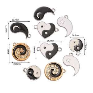 Various Yin Yang charms in heart and moon shapes with size measurements for DIY jewelry