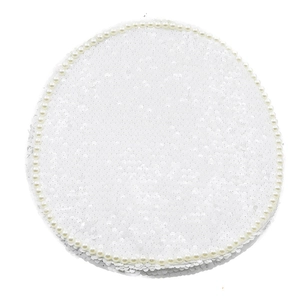 Close-up of white sequins and faux pearl border on a bridal party hat decoration