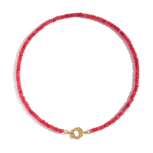 Detail of red stone beaded necklace with a golden T-bar toggle clasp on white background