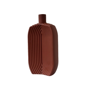 Minimalist terracotta ceramic vase with arched ribbed texture for modern home decor