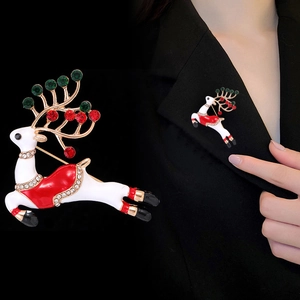 Fashion Christmas reindeer brooch with white enamel and rhinestones on black suit lapel