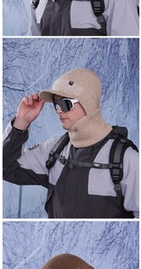 Detail of winter knitted mask hat with integrated neck warmer and windproof fleece lining