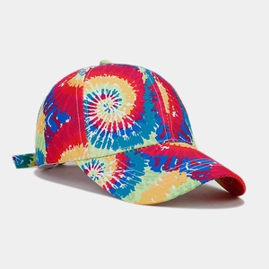Detailed close-up of rainbow tie-dye cotton baseball cap showing vibrant spiral pattern