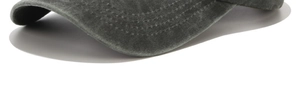 Macro shot of washed cotton baseball cap brim with five-row reinforced stitching detail