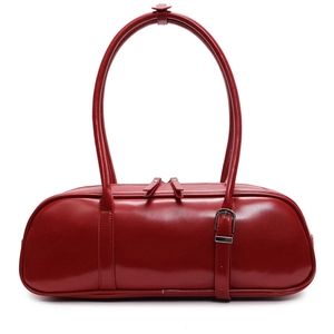 Classic red baguette bag in glossy PU leather with double handles and metal buckle detail