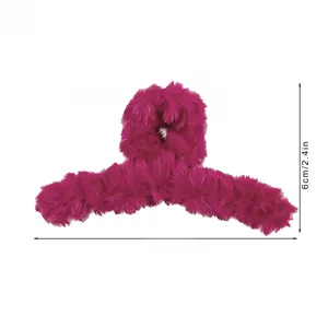 Detail view of pink plush hair claw clip showing size 13.5cm and 25g weight details