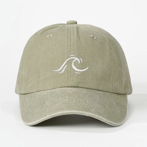 Close-up of olive green washed cotton baseball cap with white wave embroidery