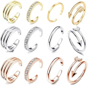 Macro view of 12-piece crystal cuff earring set in gold, silver and rose gold finishes