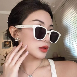 Stylish white square frame sunglasses with black lenses and chic trendy side lettering