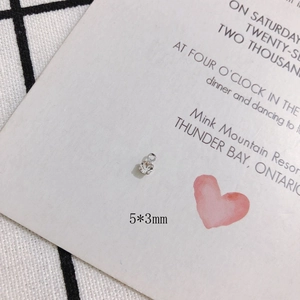 Detailed close-up of a 5x3mm rhinestone pendant connector on white background card
