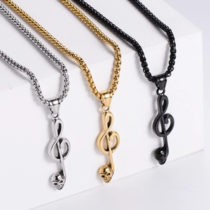 Three-color skull music note necklaces in silver gold and black on white stones