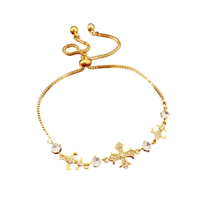 Bracelet ajustable plaqué or avec pendentif croix étincelant et accents en zircone blanc