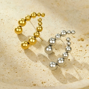 Luxe curved titanium steel stud earrings with gradient metallic beads in gold and silver