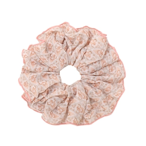 Floral print oversized scrunchie in pink and beige with contrasting pink stitched edges