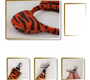 Detailed view of tiger print plush ears hairpins with soft filling and metal clips
