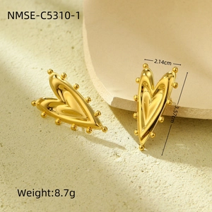 Detailed view of gold heart stud earrings showing 3.57cm height and 8.7g weight specs