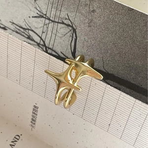 Modern gold plated open ring with minimalist starburst design and adjustable band
