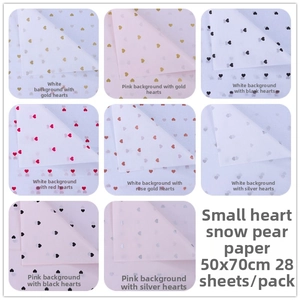 Detailed palette of heart-pattern tissue paper for flower wrapping and gift packaging