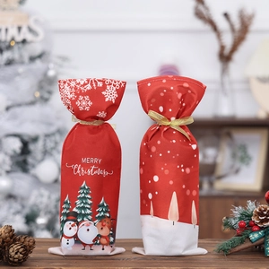 Christmas wine bottle covers with Santa and snowman patterns for festive table decor