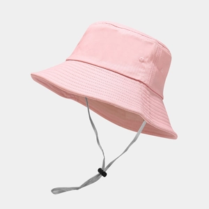 Detail of pink wide brim bucket hat with adjustable windproof cord and reinforced stitching