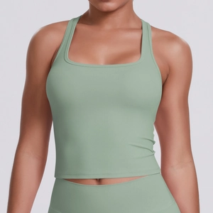 Detail of light green sports vest featuring square neck and breathable ribbed fabric