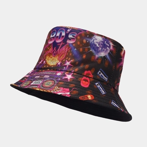 Detail of 80s retro party bucket hat with vibrant neon graffiti print on black fabric