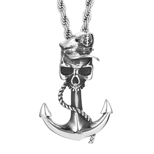 Silver stainless steel skull pendant with captain hat and anchor on white background