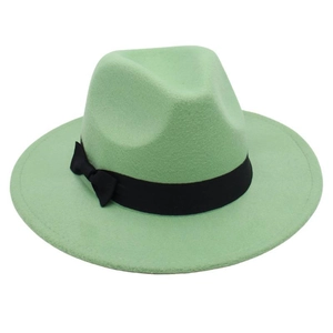 Close-up of mint green wool felt fedora hat with a black grosgrain ribbon and bow detail