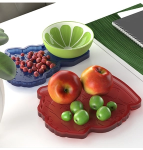 Detailed top view of DIY resin trays with cartoon silhouettes for fruit and snacks