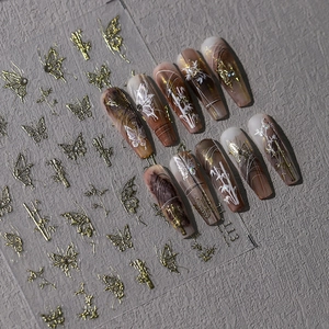 Stickers ongles papillon et bambou dorés en relief 3D avec faux ongles marbrés TL-113