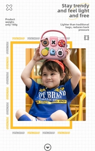 Pink cartoon children handbag with decorative charms and lightweight design weighing 160g