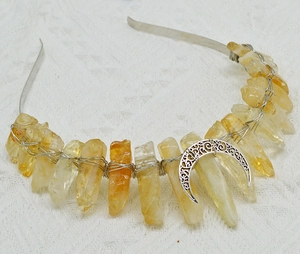 Detail of crystal fluorite moon crown headband with silver wire wrapping and crescent detail