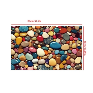 Close-up of 80x50cm pebble print bath mat showing detailed colorful stone patterns