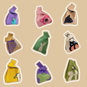 Collection of various cartoon knitted tote bags with cute animal and floral patterns