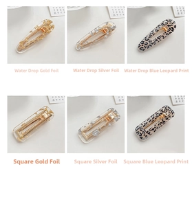 Detailed set of acrylic leopard print and gold foil teardrop and square hair clips