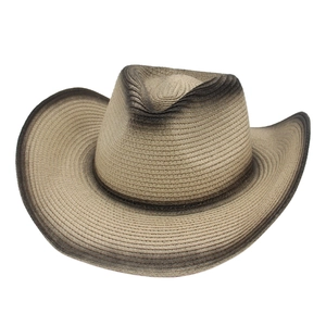 Classic woven straw cowboy hat with a wide brim and natural gradient finish in beige brown