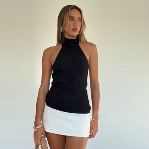 Slim fit black halter neck knit tank top for women with a chic high collar design
