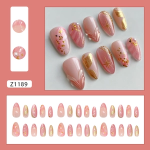Starry cat eye press-on nails set with gold leaf and 3D metallic line details