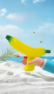Close-up of ergonomic handle and red trigger on banana-shaped water gun toy