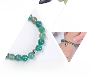 Detail of 8mm green agate healing bracelet for women with heart pendant and card