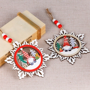 Three-layer wooden snowflake ornament with gnome pattern and red beads for Christmas tree