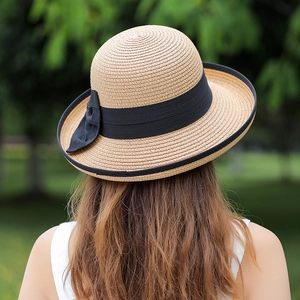 Women's foldable khaki straw hat with black ribbon, elegant sun protection beach style