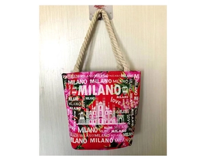 Detail of red canvas beach bag with cotton rope handles and Milano foam letters