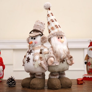 Plüschige Weihnachtspuppen mit Teleskopbeinen im Weihnachtsmann und Schneemann Design